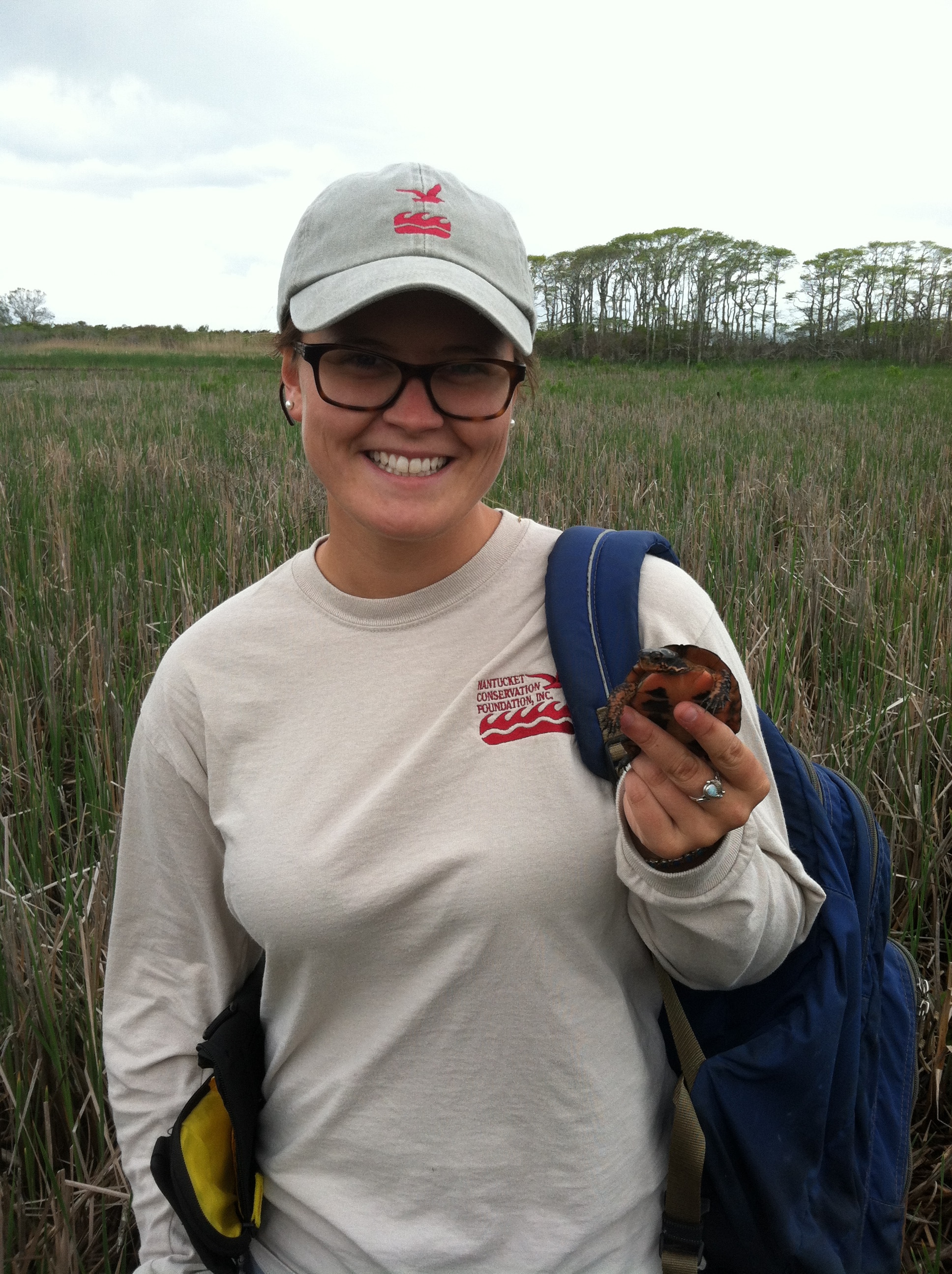 Sara holding a painted turtle found at Medouie